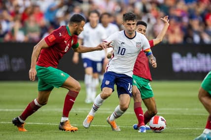 Jun 1, 2022; Cincinnati, Ohio, USA; United States forward Christian Pulisic (10) dribbles the ball while Morocco midfielder Imran Louza (7) defends during an International friendly soccer match at TQL Stadium. Mandatory Credit: Trevor Ruszkowski-USA TODAY Sports