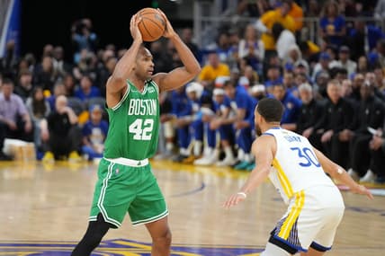 Jun 2, 2022; San Francisco, California, USA; Boston Celtics forward Al Horford (42) controls the ball while defended by Golden State Warriors guard Stephen Curry (30) during the third quarter in game one of the 2022 NBA Finals at Chase Center. Mandatory Credit: Kyle Terada-USA TODAY Sports