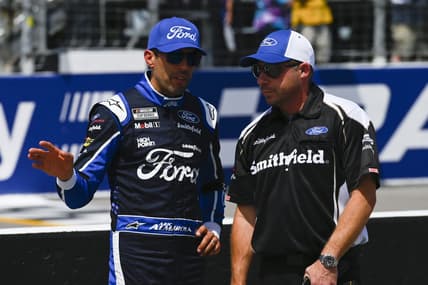 Jun 4, 2022; Madison, Illinois, USA; NASCAR Cup Series driver Chase Briscoe (14) speaks with a crew member during Nascar Cup qualifying at World Wide Technology Raceway at Gateway. Mandatory Credit: Joe Puetz-USA TODAY Sports