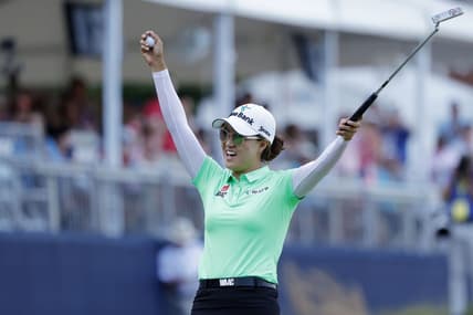 Jun 5, 2022; Southern Pines, North Carolina, USA; Minjee Lee celebrates on the eighteenth green after winning the U.S. Women's Open. Mandatory Credit: Geoff Burke-USA TODAY Sports