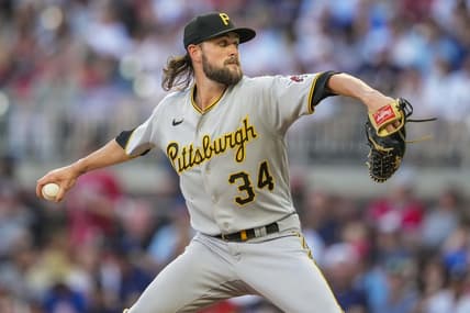 Jun 9, 2022; Cumberland, Georgia, USA; Pittsburgh Pirates starting pitcher JT Brubaker (34) pitches against the Atlanta Braves during the second inning at Truist Park. Mandatory Credit: Dale Zanine-USA TODAY Sports