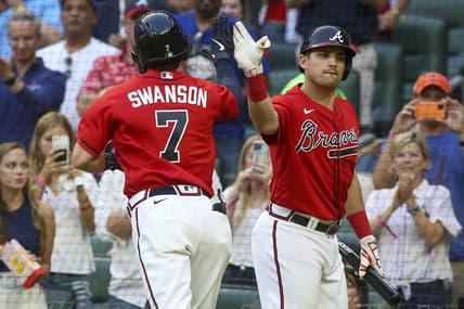 Jun 10, 2022; Atlanta, Georgia, USA; Atlanta Braves shortstop Dansby Swanson (7) celebrates after a two-run home run with third baseman Austin Riley (27) against the Pittsburgh Pirates in the third inning at Truist Park. Mandatory Credit: Brett Davis-USA TODAY Sports