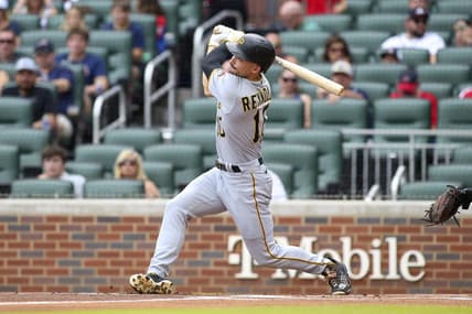 Jun 11, 2022; Atlanta, Georgia, USA; Pittsburgh Pirates center fielder Bryan Reynolds (10) hits a home run against the Atlanta Braves in the first inning at Truist Park. Mandatory Credit: Brett Davis-USA TODAY Sports
