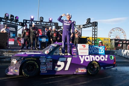 Jun 11, 2022; Sonoma, California, USA;  NASCAR Truck Series driver Kyle Busch (51) celebrates with his team after winning the NASCAR Truck Series DoorDash 250 at Sonoma Raceway. Mandatory Credit: Stan Szeto-USA TODAY Sports