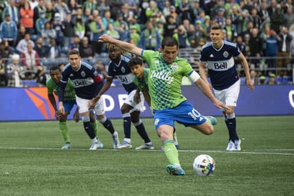 Jun 14, 2022; Seattle, Washington, USA; Seattle Sounders midfielder Nicolas Lodeiro (10) scores a penalty kick during the first half against the Vancouver Whitecaps at Lumen Field. Mandatory Credit: Michael Thomas Shroyer-USA TODAY Sports