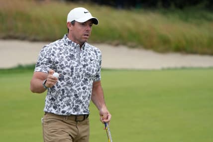 Jun 16, 2022; Brookline, Massachusetts, USA; Rory McIlroy acknowledges the crowd after a putt on the fifth green during the first round of the U.S. Open golf tournament. Mandatory Credit: John David Mercer-USA TODAY Sports