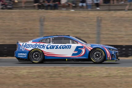 Jun 12, 2022; Sonoma, California, USA;  NASCAR Cup Series driver Kyle Larson (5) races during the NASCAR Toyota - Save Mart 350 event at Sonoma Raceway. Mandatory Credit: Stan Szeto-USA TODAY Sports