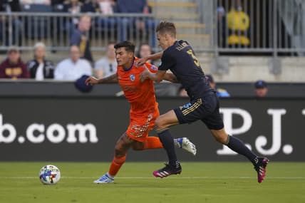 Jun 18, 2022; Chester, Pennsylvania, USA; FC Cincinnati forward Brandon Vazquez (19) controls the ball against Philadelphia Union defender Jack Elliott (3) in the first half at Subaru Park. Mandatory Credit: Mitchell Leff-USA TODAY Sports