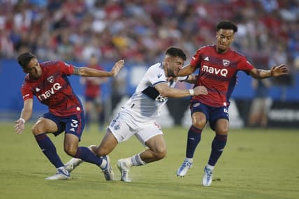 Jun 18, 2022; Frisco, Texas, USA;  Vancouver Whitecaps forward Lucas Cavallini (9) collides with FC Dallas defender Jos  Antonio Martinez (3) and Brandon Servania (18) in the first half at Toyota Stadium. Mandatory Credit: Tim Heitman-USA TODAY Sports