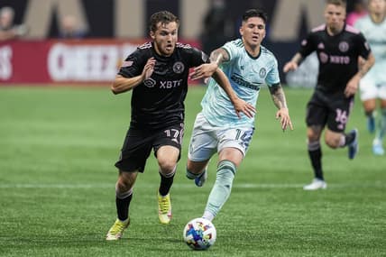 Jun 19, 2022; Atlanta, Georgia, USA; Inter Miami midfielder Indiana Vassilev (17) runs for the ball against Atlanta United midfielder Franco Ibarra (14) during the first half at Mercedes-Benz Stadium. Mandatory Credit: Dale Zanine-USA TODAY Sports