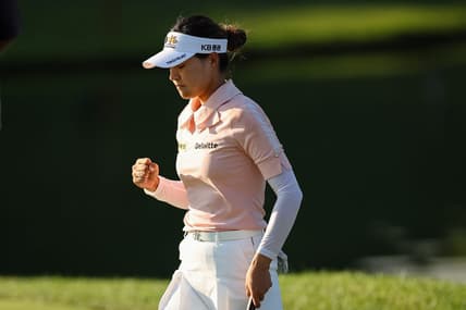 Jun 24, 2022; Bethesda, Maryland, USA; In Gee Chun celebrates after making a putt on the 18th green during the second round of the KPMG Women's PGA Championship golf tournament at Congressional Country Club. Mandatory Credit: Scott Taetsch-USA TODAY Sports