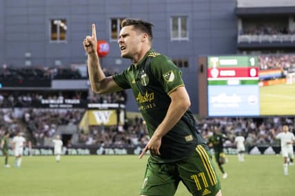 Jun 25, 2022; Portland, Oregon, USA;  Portland Timbers forward Jaroslaw Niezgoda (11) celebrates during the second half after scoring a goal against the Colorado Rapids at Providence Park. The Portland Timbers won 3-0. Mandatory Credit: Troy Wayrynen-USA TODAY Sports