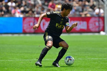 Jun 26, 2022; Los Angeles, California, USA; Los Angeles FC forward Carlos Vela (10) controls the ball against New York Red Bulls during the second half at Banc of California Stadium. Mandatory Credit: Gary A. Vasquez-USA TODAY Sports
