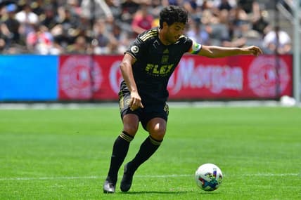 Jun 26, 2022; Los Angeles, California, USA; Los Angeles FC forward Carlos Vela (10) controls the ball against New York Red Bulls during the second half at Banc of California Stadium. Mandatory Credit: Gary A. Vasquez-USA TODAY Sports