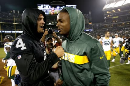 Raiders quarterback Derek Carr (4) and former Green Bay Packers wide receiver Davante Adams (17), pictured after the game at Oakland Coliseum. Mandatory Credit: Cary Edmondson-USA TODAY Sports