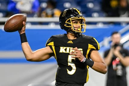 Detroit King's Dante Moore throws a pass against DeWitt during the third quarter on Saturday, Nov. 27, 2021, at Ford Field in Detroit.

211127 Dewitt Detroit King 069a