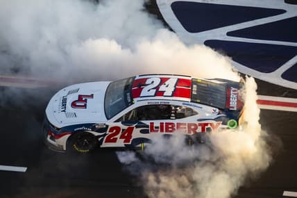 Mar 20, 2022; Hampton, Georgia, USA; NASCAR Cup Series driver William Byron celebrates after winning the Folds of Honor QuikTrip 500 at Atlanta Motor Speedway. Mandatory Credit: Mark J. Rebilas-USA TODAY Sports