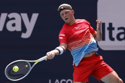 Mar 24, 2022; Miami Gardens, FL, USA; Alejandro Davidovich Fokina (ESP) hits a forehand against Sebastian Korda (USA) (not pictured) in a first round men's singles match in the Miami Open at Hard Rock Stadium. Mandatory Credit: Geoff Burke-USA TODAY Sports