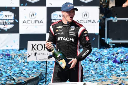 Apr 10, 2022; Long Beach, California, USA; Team Penske driver Josef Newgarden (2) of United States celebrates his victory of the Grand Prix of Long Beach at Long Beach Street Circuit. Mandatory Credit: Gary A. Vasquez-USA TODAY Sports