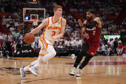 Apr 26, 2022; Miami, Florida, USA; Atlanta Hawks guard Kevin Huerter (3) drives the ball around Miami Heat guard Gabe Vincent (2) during the second half in game five of the first round for the 2022 NBA playoffs at FTX Arena. Mandatory Credit: Jasen Vinlove-USA TODAY Sports