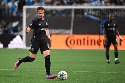 May 14, 2022; Charlotte, North Carolina, USA; CF Montreal midfielder Djordje Mihailovic (8) with the ball in the second half at Bank of America Stadium. Mandatory Credit: Bob Donnan-USA TODAY Sports