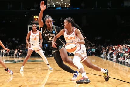 May 17, 2022; Brooklyn, New York, USA;  Connecticut Sun guard Nia Clouden (11) and New York Liberty forward Michaela Onyenwere (12) at Barclays Center. Mandatory Credit: Wendell Cruz-USA TODAY Sports