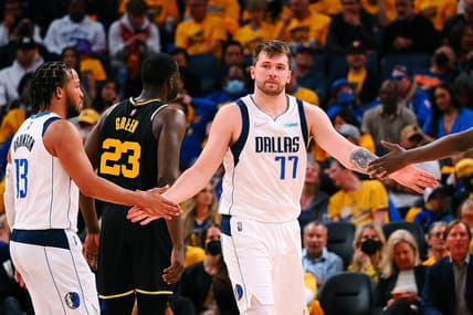 May 26, 2022; San Francisco, California, USA; Dallas Mavericks guard Luka Doncic (77) high fives guard Jalen Brunson (13) after a play against the Golden State Warriors during the second half of game five of the 2022 western conference finals at Chase Center. Mandatory Credit: Kelley L Cox-USA TODAY Sports