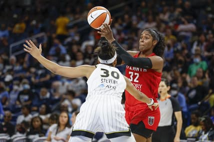 Jun 17, 2022; Chicago, Illinois, USA; Atlanta Dream forward Cheyenne Parker (32) looks to pass the ball against Chicago Sky forward Azura Stevens (30) during the first half of a WNBA game at Wintrust Arena. Mandatory Credit: Kamil Krzaczynski-USA TODAY Sports