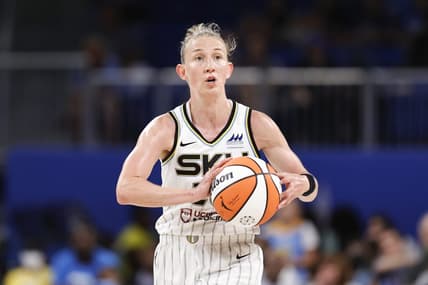 Jun 17, 2022; Chicago, Illinois, USA; Chicago Sky guard Courtney Vandersloot (22) looks to pass the ball against the Atlanta Dream during the second half of a WNBA game at Wintrust Arena. Mandatory Credit: Kamil Krzaczynski-USA TODAY Sports