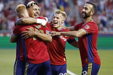 Jun 18, 2022; Sandy, Utah, USA; Real Salt Lake defender Marcelo Silva (30) celebrates after his first half goal w9th defender Justen Glad (15), defender Jasper Loffelsend (28) and forward Justin Meram (9) against the San Jose Earthquakes at Rio Tinto Stadium. Mandatory Credit: Jeffrey Swinger-USA TODAY Sports