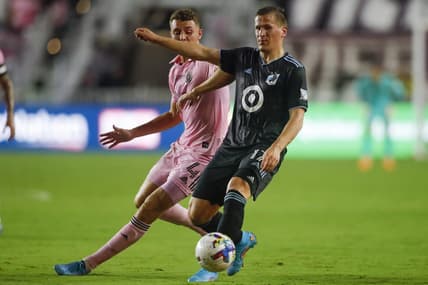 Jun 25, 2022; Fort Lauderdale, Florida, USA; Minnesota United midfielder Robin Lod (17) passes the ball against Inter Miami CF defender Christopher McVey (4) during the first half at DRV PNK Stadium. Mandatory Credit: Sam Navarro-USA TODAY Sports