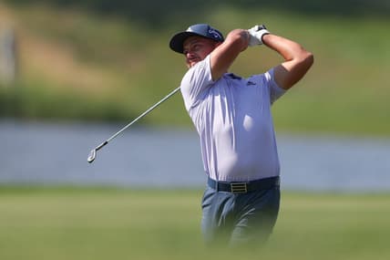 Jun 26, 2022; Cromwell, Connecticut, USA; Xander Schauffele plays a shot from the fairway of the 13th hole during the final round of the Travelers Championship golf tournament. Mandatory Credit: Vincent Carchietta-USA TODAY Sports