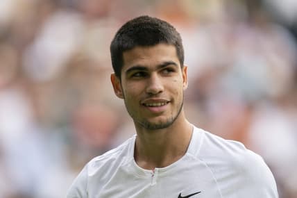Jul 3, 2022; London, United Kingdom; Carlos Alcaraz (ESP) during his match against Jannik Sinner (ITA) on day seven at All England Lawn Tennis and Croquet Club. Mandatory Credit: Susan Mullane-USA TODAY Sports