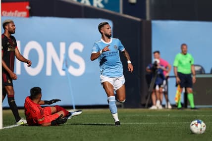 Jul 3, 2022; New York, New York, USA; New York City FC midfielder Valentin Castellanos (11) celebrates his goal  past Atlanta United goalkeeper Rocco Rios Novo (34) during the first half at Yankee Stadium. Mandatory Credit: Vincent Carchietta-USA TODAY Sports