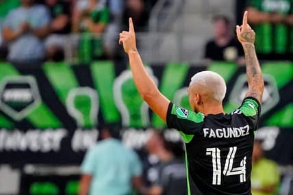Jul 12, 2022; Austin, Texas, USA; Austin FC forward Diego Fagundez (14) celebrates after scoring a goal against the Houston Dynamo during the first half at Q2 Stadium. Mandatory Credit: Scott Wachter-USA TODAY Sports