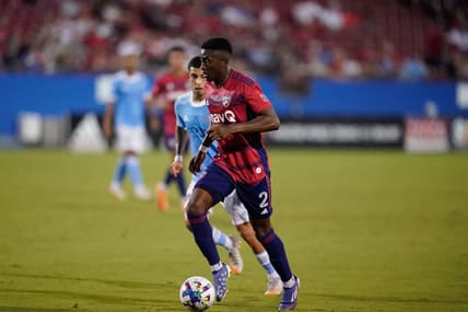 Jul 13, 2022; Frisco, Texas, USA; FC Dallas defender Eddie Munjoma (2) controls the ball against New York City FC midfielder Nicolas Acevedo (26) during the first half at Toyota Stadium. Mandatory Credit: Chris Jones-USA TODAY Sports