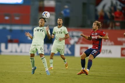 Jul 16, 2022; Frisco, Texas, USA; Austin FC midfielder Daniel Pereira (6) heads the ball against FC Dallas midfielder Paxton Pomykal (19) at Toyota Stadium. Mandatory Credit: Tim Heitman-USA TODAY Sports