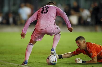 Jul 16, 2022; Fort Lauderdale, Florida, USA; Inter Miami CF forward Alejandro Pozuelo (8) controls the ball as Charlotte FC goalkeeper Kristijan Kahlina (1) attempts to steal the ball during the first half at DRV PNK Stadium. Mandatory Credit: Sam Navarro-USA TODAY Sports