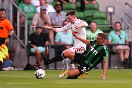 Austin FC midfielder Alex Ring (8) dives to block New York Red Bulls forward Cameron Harper (17) during the match at Q2 Stadium in Austin, Texas on July 24, 2022.

Aem Austin Fc Vs Ny Red Bulls 4