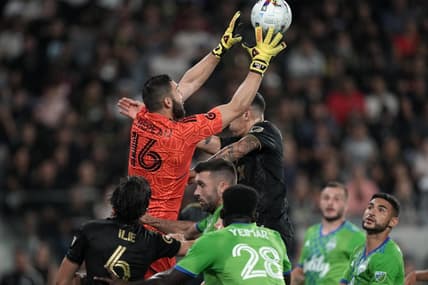 Jul 29, 2022; Los Angeles, California, USA; LAFC goalkeeper Maxime Crepeau (16) makes a save against the Seattle Sounders in the first half at Banc of California Stadium. Mandatory Credit: Kirby Lee-USA TODAY Sports