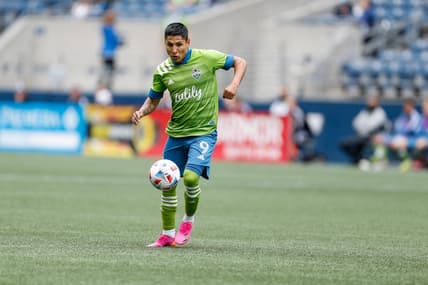 May 23, 2021; Seattle, Washington, USA; Seattle Sounders FC forward Raul Ruidiaz (9) dribbles the ball against the Atlanta United FC during the first half at Lumen Field. Mandatory Credit: Jennifer Buchanan-USA TODAY Sports