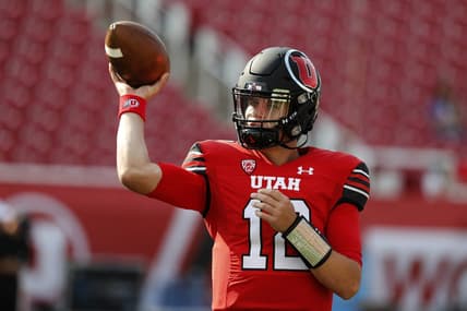 Sep 2, 2021; Salt Lake City, Utah, USA; Utah Utes quarterback Charlie Brewer (12) warm up prior to their game against the Weber State Wildcats  at Rice-Eccles Stadium. Mandatory Credit: Jeffrey Swinger-USA TODAY Sports