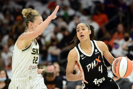 Oct 10, 2021; Phoenix, Arizona, USA; Phoenix Mercury guard Skylar Diggins-Smith (4) dribbles against Chicago Sky guard Courtney Vandersloot (22) during the first half of game one of the 2021 WNBA Finals at Footprint Center. Mandatory Credit: Joe Camporeale-USA TODAY Sports