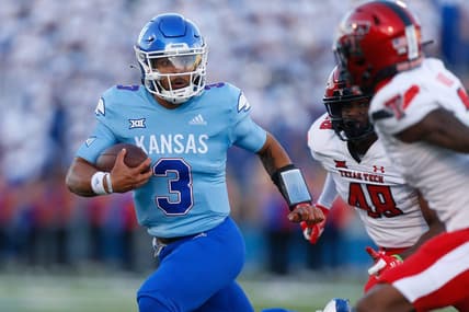 Kansas redshirt senior quarterback Miles Kendrick (3) runs for yards during the second half of Saturday, Oct. 16, 2021 game against Texas Tech at David Booth Kansas Memorial Stadium. The Jayhawks lost 41-14.