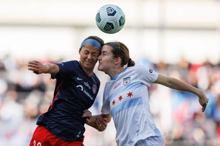 Nov 20, 2021; Louisville, Kentucky, USA; Washington Spirit forward Ashley Hatch (33) heads the ball against Chicago Red Stars defender Casey Krueger (6) during the NWSL Championship match at Lynn Family Stadium. Mandatory Credit: Jordan Prather-USA TODAY Sports