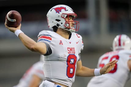 Nov 20, 2021; Cincinnati, Ohio, USA; Southern Methodist Mustangs quarterback Tanner Mordecai (8) throws a pass against the Cincinnati Bearcats in the first half at Nippert Stadium. Mandatory Credit: Katie Stratman-USA TODAY Sports