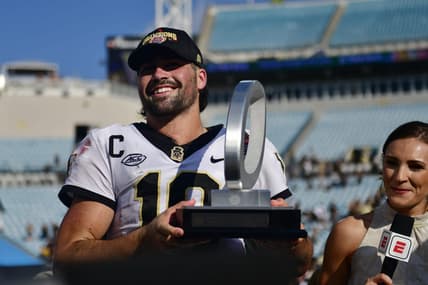 Wake Forest Demon Deacons quarterback Sam Hartman (10) holds up the MVP trophy after the game Friday, Dec. 31, 2021 at TIAA Bank Field in Jacksonville. The Wake Forest Demon Deacons and the Rutgers Scarlet Knights faced each other in the 2021 TaxSlayer Gator Bowl. Wake Forest defeated Rutgers 38-10. [Corey Perrine/Florida Times-Union]