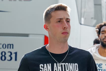 Apr 13, 2022; New Orleans, Louisiana, USA;   San Antonio Spurs forward Joe Wieskamp (15) arrives before playing against the New Orleans Pelicans at the Smoothie King Center. Mandatory Credit: Stephen Lew-USA TODAY Sports