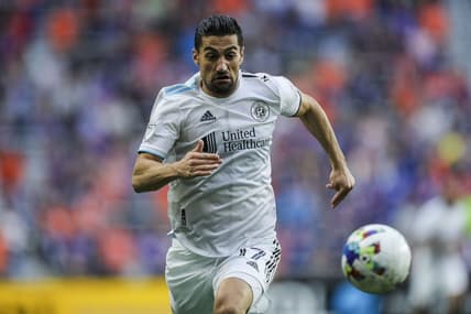 May 21, 2022; Cincinnati, Ohio, USA; New England Revolution midfielder Sebastian Lletget (17) cashes the ball against FC Cincinnati in the first half at TQL Stadium. Mandatory Credit: Katie Stratman-USA TODAY Sports