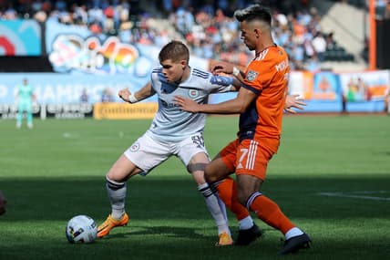May 22, 2022; New York, NY, New York, NY, USA; Chicago Fire forward Chris Mueller (8) controls the ball against New York City FC midfielder Alfredo Morales (7) during the first half at Citi Field. Mandatory Credit: Brad Penner-USA TODAY Sports